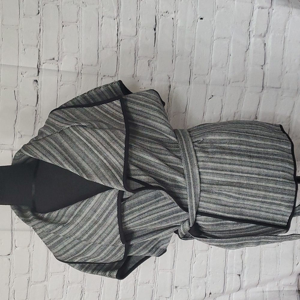 XL in size, black in bone belted short sleeve open cover